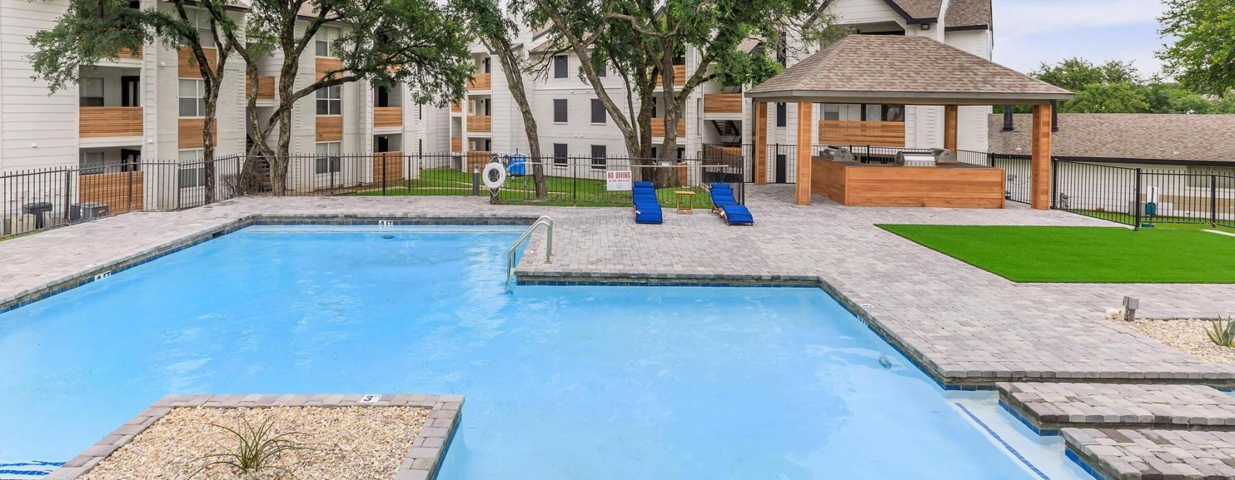 a swimming pool in a backyard