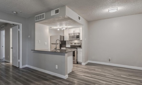 Beautiful kitchens with designer finishes well lit kitchen next to dining area